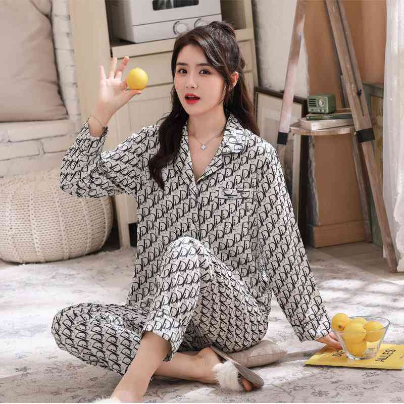 Ice silk couple printed letter long-sleeved two-piece satin chiffon men and women Pajamas on sale