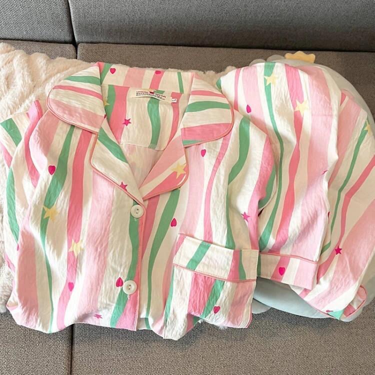 Shop this cozy rainbow long-sleeve pajama set for women! Made from soft cloud cotton, this colorful two-piece sleepwear offers warmth and comfort for year-round home lounging.