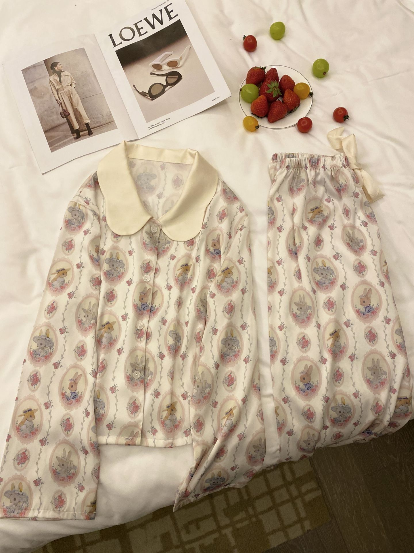 Our women's bunny pajamas are made with high-quality ice silk for ultimate comfort. The cute bunny print and doll collar add a touch of fun to your bedtime routine.