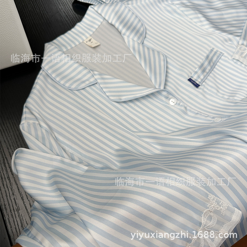 Wrap yourself in luxury with our soft blue silk pajamas. Featuring a chic striped design and delicate lace details, these pajamas are perfect for relaxing at home.